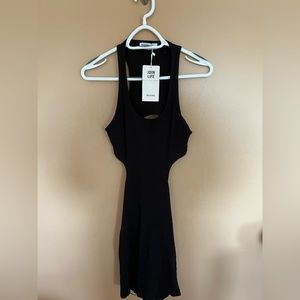 Size medium black backless Berksha dress. Never worn.